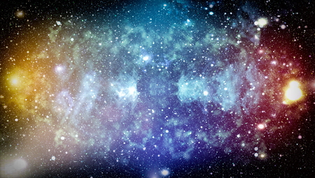 Blue dark night sky with many stars. Milky way on the space backgroundの写真素材