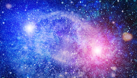 Blue dark night sky with many stars. Milky way on the space backgroundの写真素材