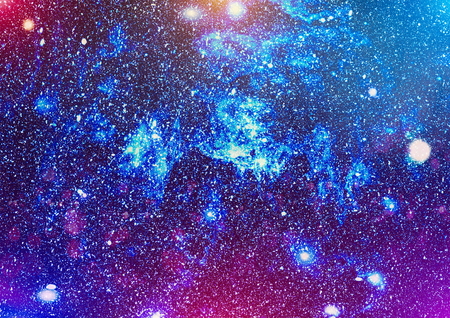 Blue dark night sky with many stars. Milky way on the space backgroundの写真素材
