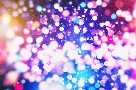 abstract blurred of blue and silver glittering shine bulbs lights background:blur of Christmas wallpaper decorations concept.xmas holiday festival backdrop:sparkle circle lit celebrations display.の写真素材