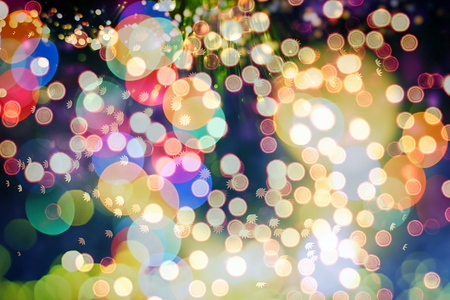 abstract blurred and silver glittering shine bulbs lights background:blur of Christmas wallpaper decorations concept.holiday festival backdrop:sparkle circle lit celebrations displayの写真素材