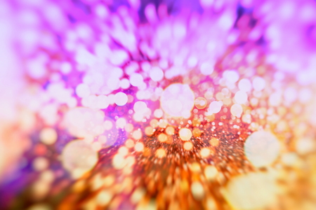 Abstract bokeh background. Christmas Glittering background. Abstract christmas background. Glittering Christmas background. Yellow christmas background Glitter christmas background.の写真素材