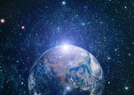 Earth, sun and galaxy.の写真素材