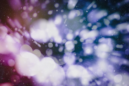 Abstract light celebration background with defocused golden lights for Christmas, New Year, Holiday,...