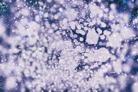Blurred bokeh light background, Christmas and New Year holidays backgroundの写真素材