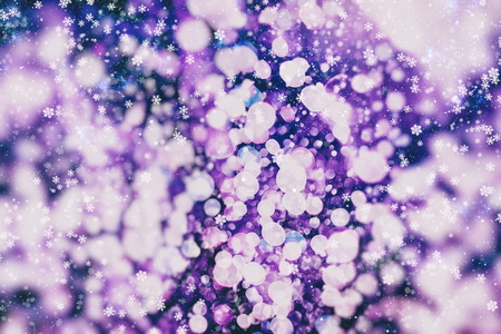 Blurred bokeh light background, Christmas and New Year holidays backgroundの写真素材