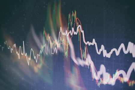 Technical price graph and indicator, red and green candlestick chart on blue theme screen, market volatility, up and down trend. Stock trading, crypto currency background.の写真素材