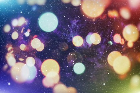 Christmas light background. Holiday glowing backdrop. Defocused Background With Blinking Stars.の写真素材