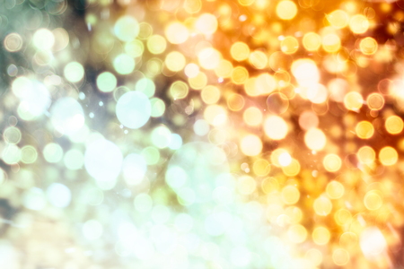 Christmas light background. Holiday glowing backdrop. Defocused Background With Blinking Stars. Blurred Bokeh.の写真素材