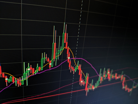 Stock market graph on led screen. Finance and investment concept. Selective focus Stock market graph on led screen. Finance and investment concept. Selective focus