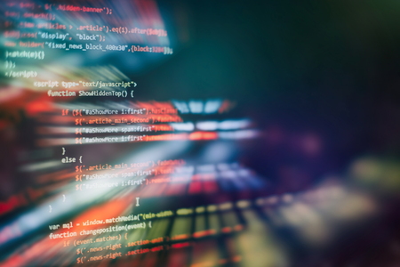 Website HTML Code on the Laptop Display Closeup Photo. Desktop PC monitor photo.の写真素材