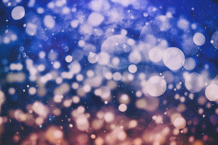 Blurred bokeh light background, Christmas and New Year holidays backgroundの写真素材
