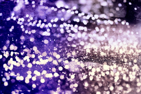 Festive Christmas background. Elegant abstract background with lights and starsの写真素材