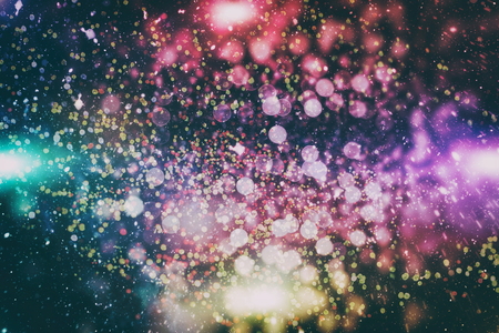 glittering shine bulbs lights background:blur of Christmas wallpaper decorations concept.holiday festival backdrop:sparkle circle lit celebrations display.の写真素材