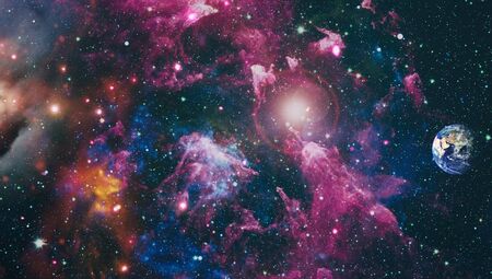 Giant glowing nebula. Space background with red nebula and stars.
