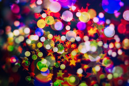 Vintage magic background with color festive background with natural bokeh and bright golden lights.の写真素材