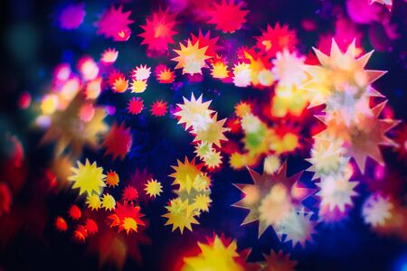 Vintage magic background with color festive background with natural bokeh and bright golden lights.の写真素材