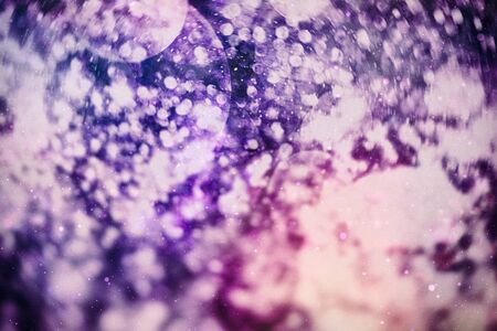 Festive background with natural bokeh and bright golden lights. Vintage magic background with colorful bokeh. Spring summer Christmas new year disco party background.の写真素材