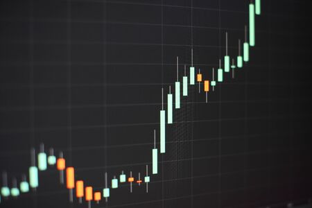 Economic graph with diagrams on the stock market, for business and financial concepts and reports.の写真素材