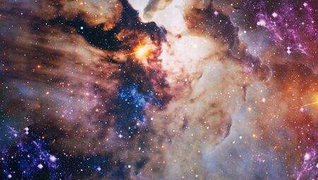 Space background with red nebula and stars.の写真素材