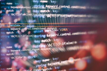Software developer programming code.Monitor with stock data, closeup. Financial trading concept