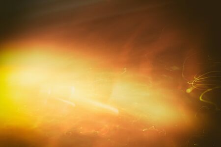 Magic Background With Color Festive background with natural bokeh and bright golden lights....