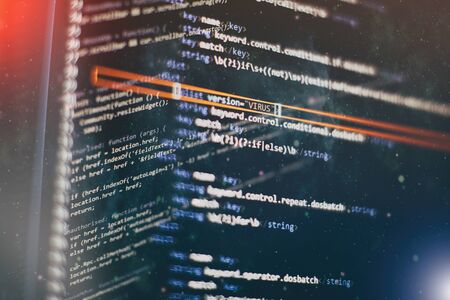 Coding script text on screen. Notebook closeup photo. CSS, JavaScript and HTML usage.