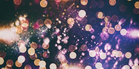Magic Background With Color Festive background with natural bokeh and bright golden lights. Vintage Magic backgroundの写真素材
