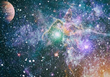 Giant glowing nebula. Space background with red nebula and stars.