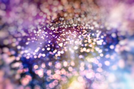 Defocused Background With Blinking Stars and sparks. Blurred Xmas Bokeh. Greeting card art design