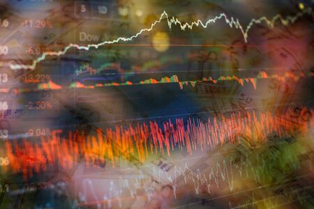 Technical price graph and indicator, red and green candlestick chart on blue theme screen, market volatility, up and down trend. Stock trading, crypto currency background.の写真素材