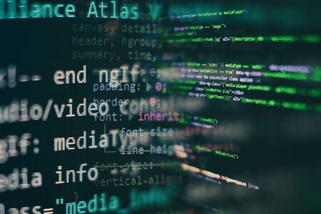 Closeup developing programming and coding technologies. Developer working on web sites codes in...