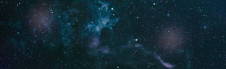 New large panoramic looking into deep space. Dark night sky full of stars. The nebula in outer...