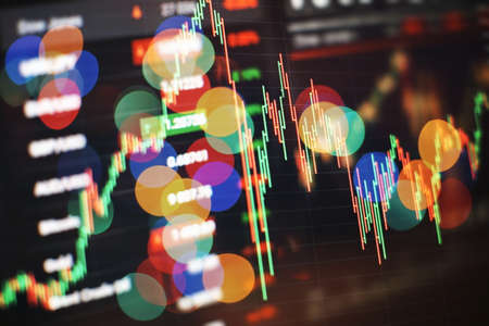 Economic graph with diagrams on the stock market, for business and financial concepts and reports.Abstract blue background.の写真素材