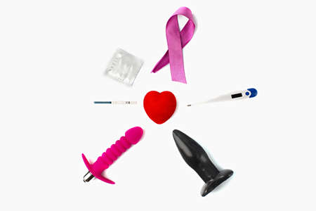 Sex toys and accessories on white background