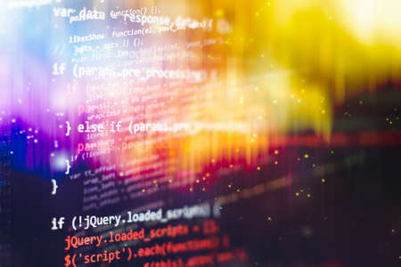 HTML5 in editor for website development. Website HTML Code on the Laptop Display Closeup Photo....