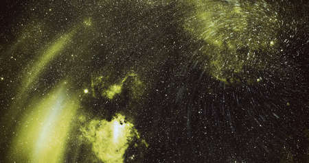 Astronomy graphic design background with nebula and glowing stars in deep universe. Abstract image.の写真素材