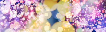 Background with colorful and illuminating lights in circle shapes with black background, new year...