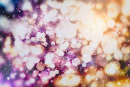 Background with colorful and illuminating lights in circle shapes with black background, new year...