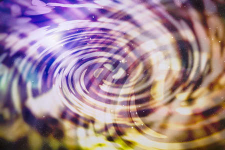 Christmas lights. Gold Holiday New year Abstract Glitter Defocused Background With Blinking Stars and sparks.の写真素材