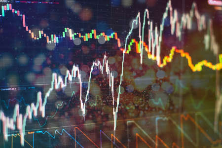 Professional market analysis. Office monitor background. Busines analysing stock market data on a...