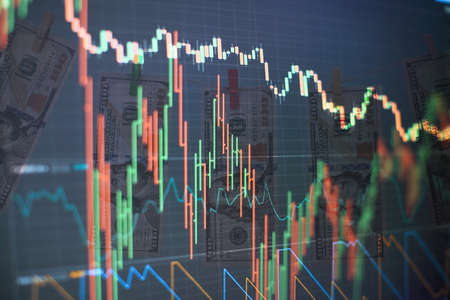 Professional market analysis. Office monitor background. Busines analysing stock market data on a monitor.の写真素材