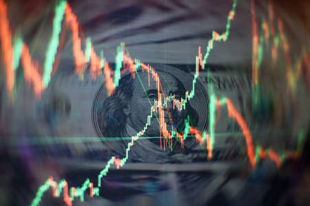 Charts of financial instruments with various type of indicators including volume analysis for professional technical analysis on the monitor of a computer.の写真素材