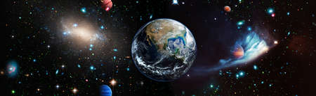 Planet Earth view. The World Globe from Space in a star field showing the terrain and clouds.の写真素材