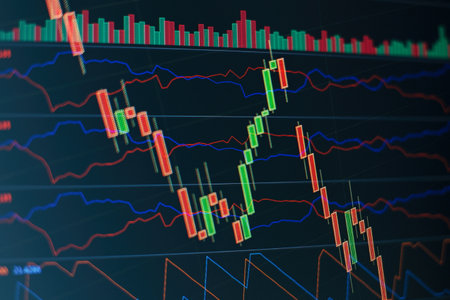 Technical price graph and indicator, red and green candlestick chart on blue theme screen, market volatility, up and down trend. Stock trading, crypto currency background.の写真素材