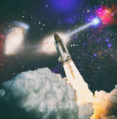 Spaceship takes off into the starry sky. Launch of Space. Elements of this image furnished by NASAの写真素材