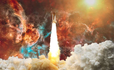 Rocket launch. Rocket with smoke flies into space. Space Shuttle. Spaceship begins the mission.