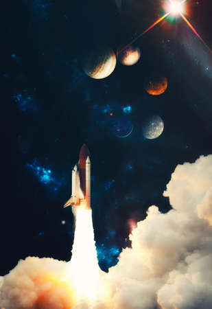 Rockets launch into space on the starry sky. Rocket starts into space concept.の写真素材