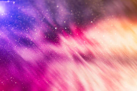 Christmas festive background. Blurred Christmas background, festive Christmas multicolor bokeh...