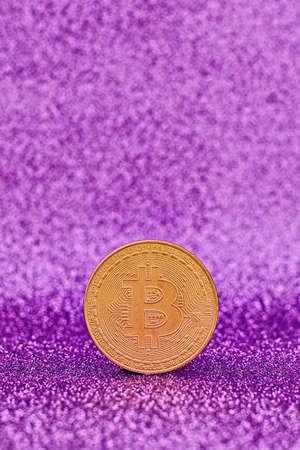 Bitcoins with Candle stick graph chart and digital background.Golden coin with icon letter B. Mining or blockchain technologyの写真素材